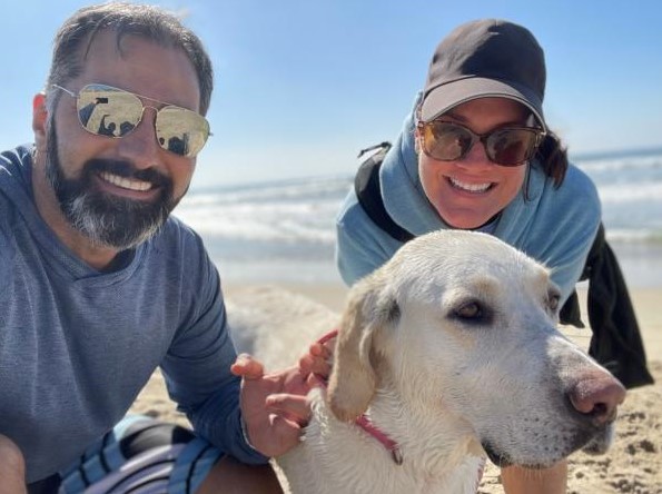 Devo Anderson CSR President at the beach with his wife Kari and dog Lizzy